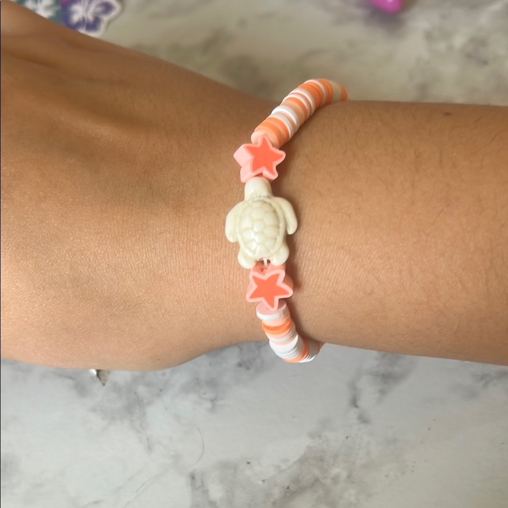 Pink and White Beaded Bracelet with Turtle Charm